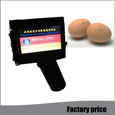 China Códigos industriais portáteis à mão da data da impressora a jato de tinta para o ovo no preto fornecedor